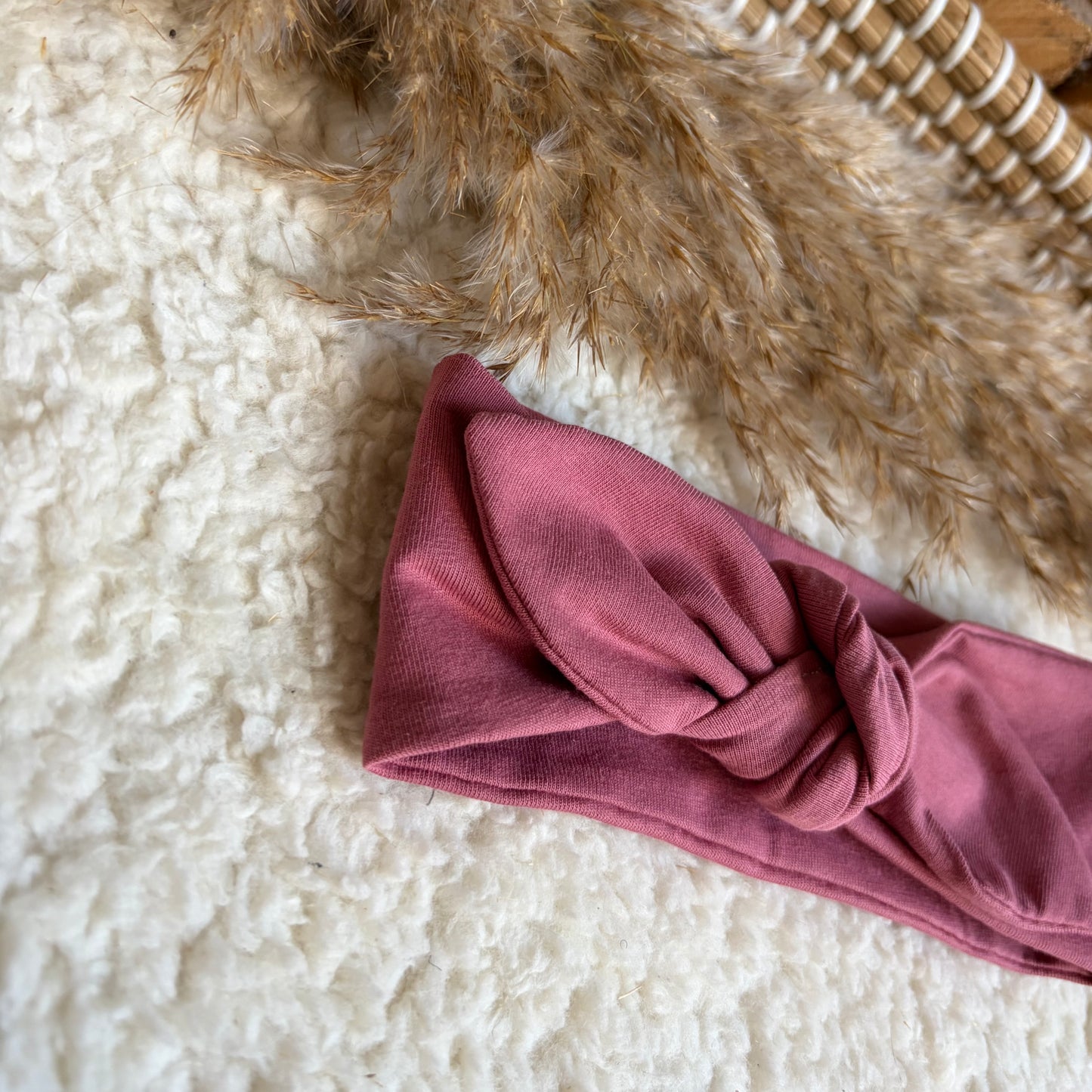 Haarband knoop donker roze