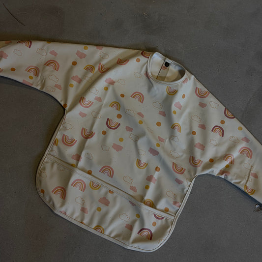 Waterproof slab met mouwen – verstelbaar (0–4 jaar) regenboog