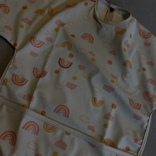 Waterproof slab met mouwen – verstelbaar (0–4 jaar) regenboog