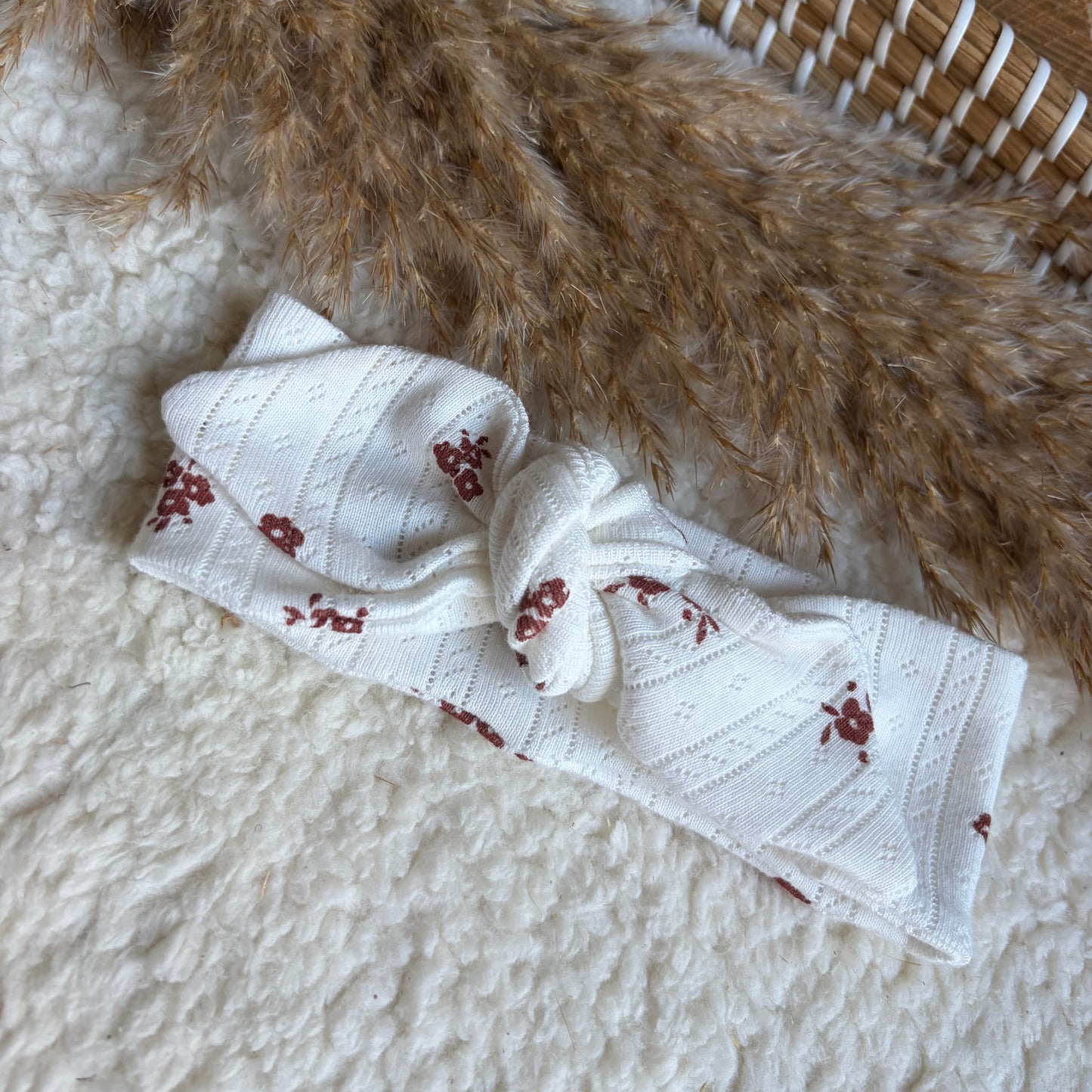 Haarband knoop broderie bloem