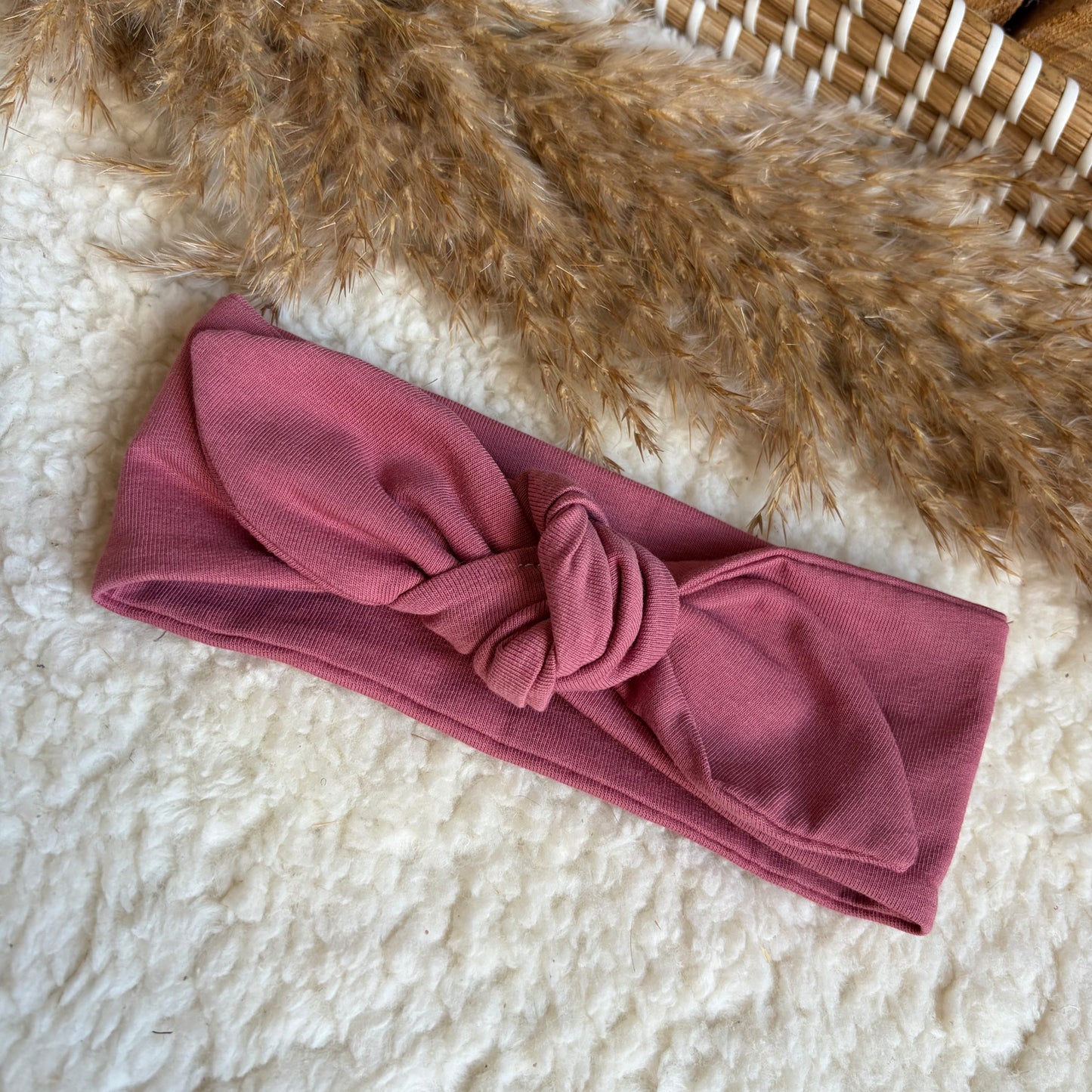 Haarband knoop donker roze