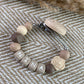 Speenkoord met naam | bloem beige